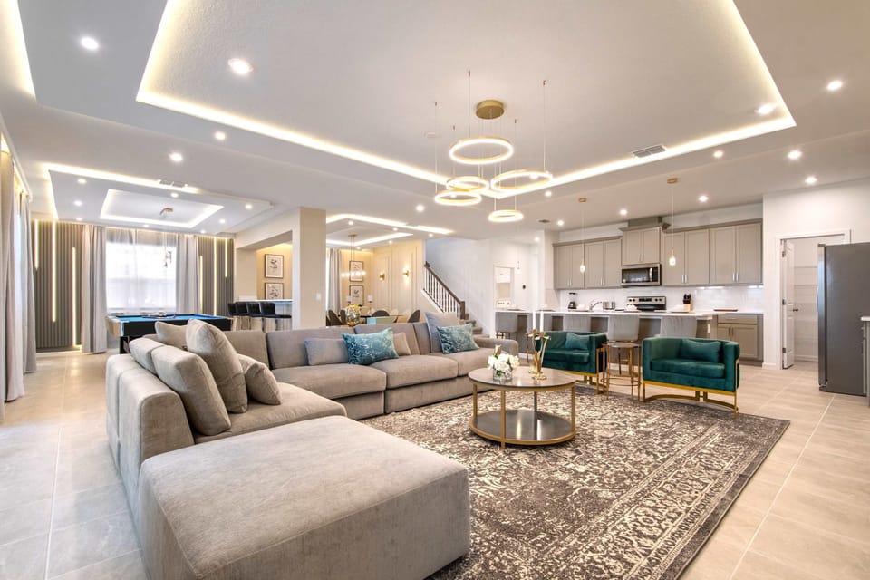 Spacious Open-Concept Living with Luxe Seating, Modern Kitchen & Designer Lighting
