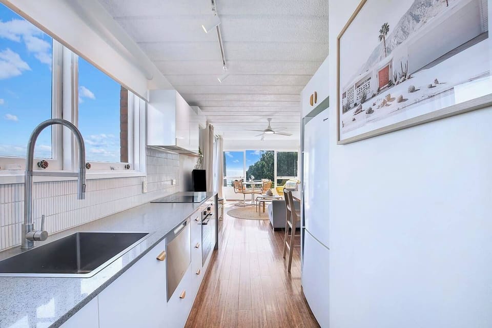 Prepare your favourites in the well-equipped galley kitchen, complete with a full-size fridge, oven, stovetop, and dishwasher.