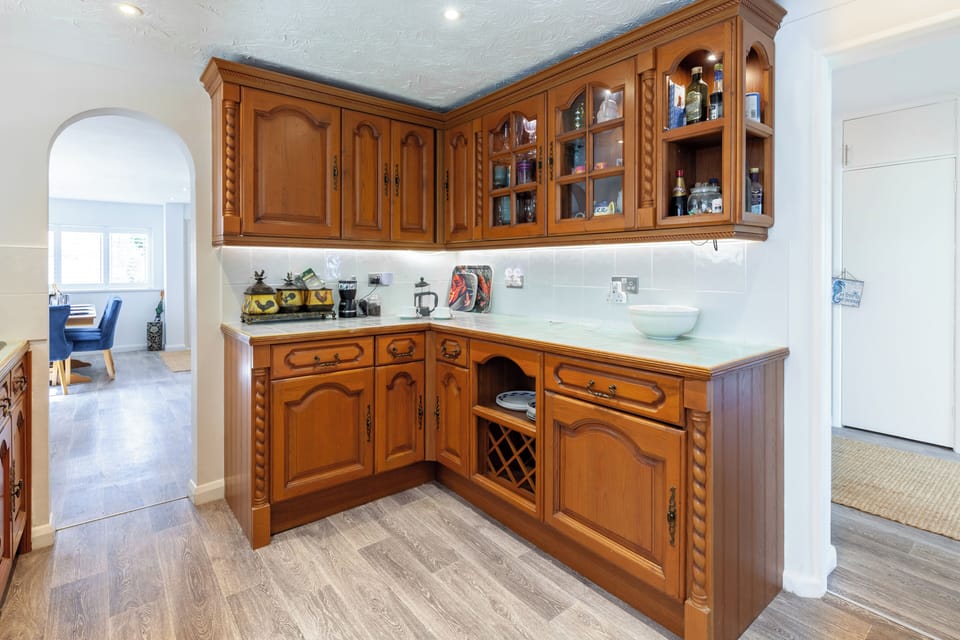 Kitchen leading to Dining Room and Snug