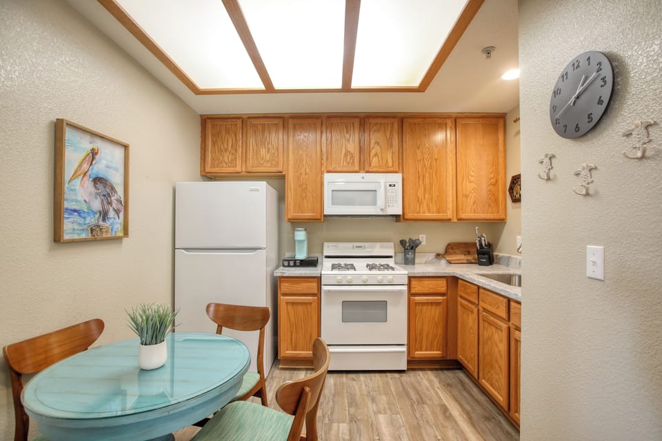 Start your day right — fresh coffee and a sunny kitchen await.