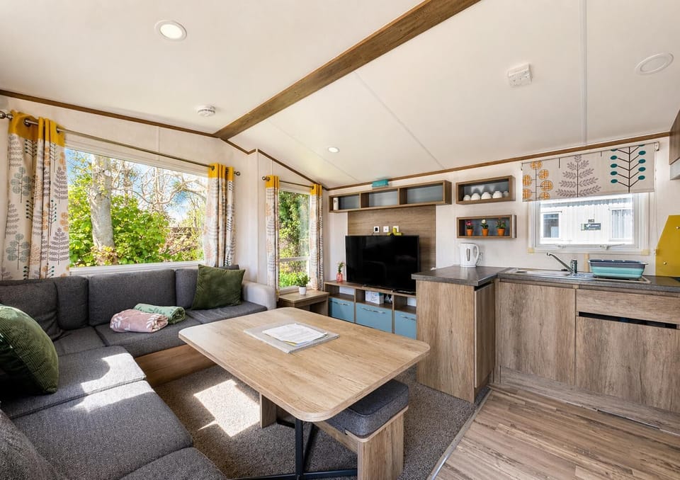 The tv in the lounge is perfect for catching up on your favourite shows whilst away on your staycation by the sea. Sit back and relax in your modern caravan in Suffolk.