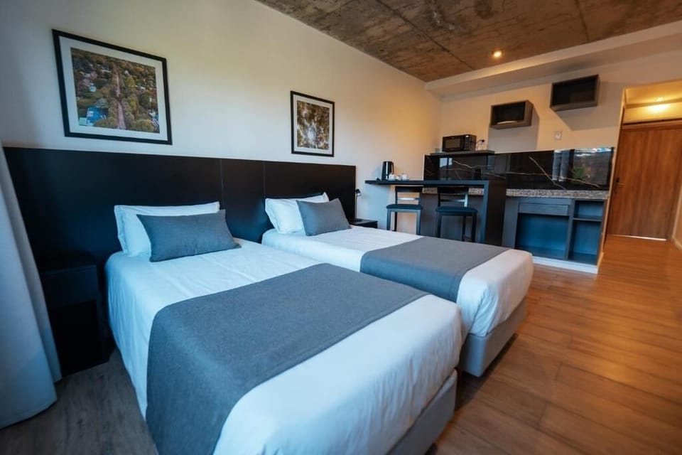 Settle into twin beds with a convenient in-room kitchenette.