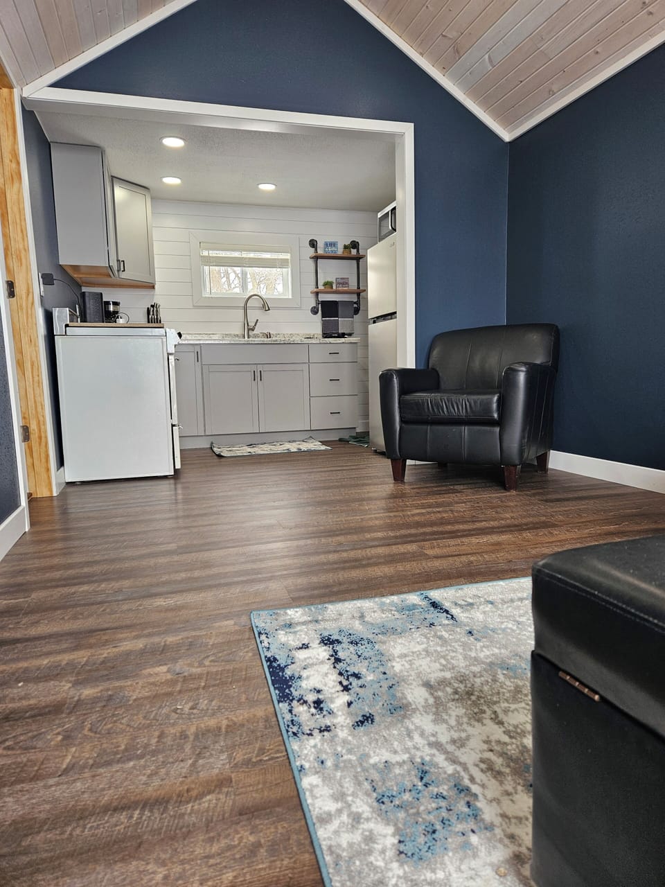 Living room and sitting area that adjoins the kitchen 