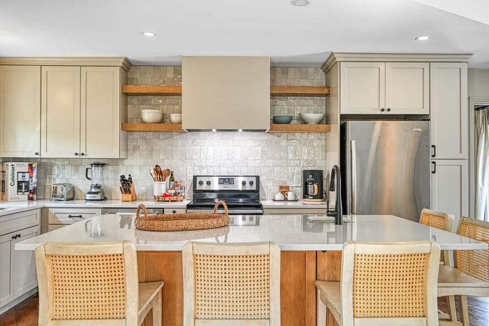 Open kitchen and dining space designed for entertaining.