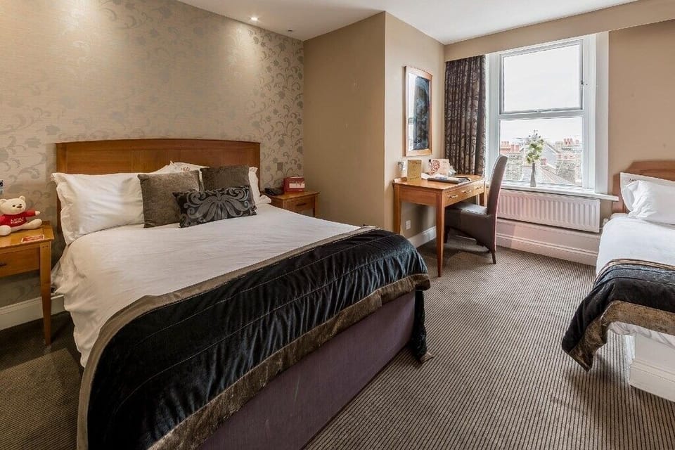 Unwind together in a bright room with flexible beds.
