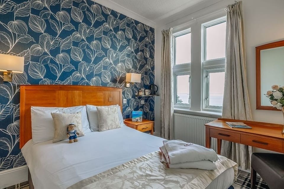 Wake to sea views and savor a serene morning in bed.