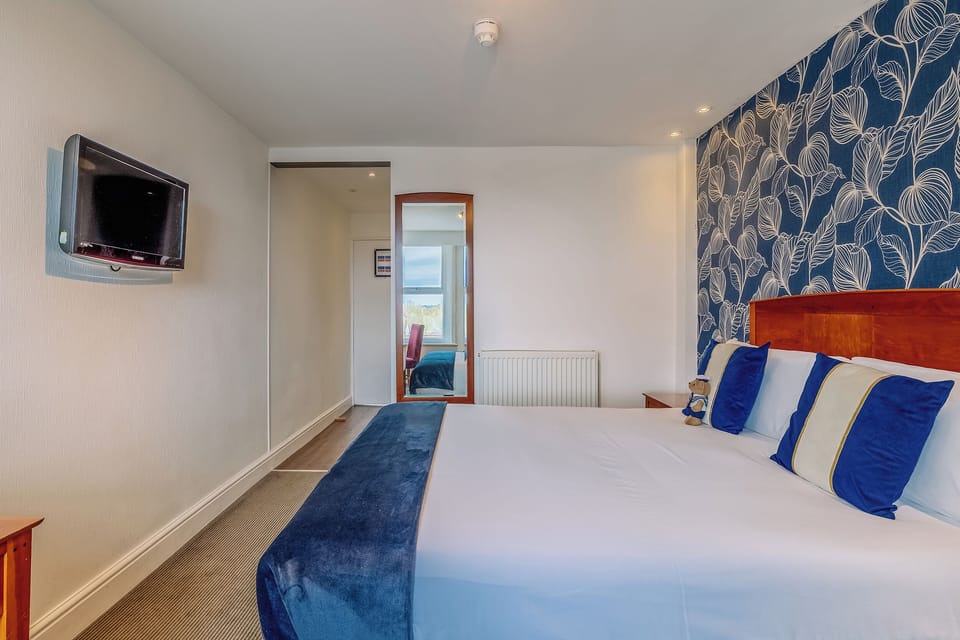 Stretch out in a spacious room designed for easy comfort.