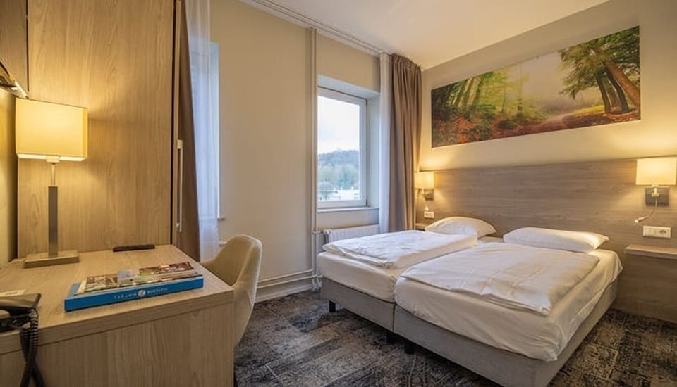 Unit with single beds. Exact unit will be assigned upon arrival. Views, colors, and decor may vary.