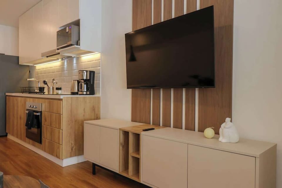 Entertainment area with TV and elegant decor