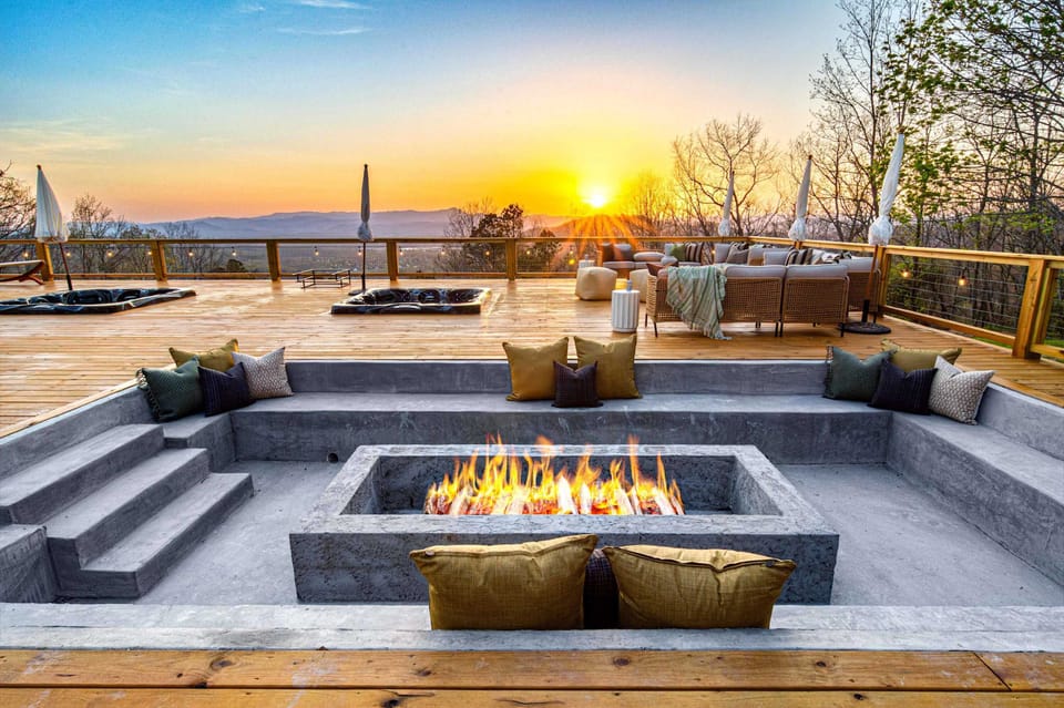 Soak in mountain serenity. With two sunken hot tubs and a custom fire pit, this deck offers the perfect spot to unwind as the sun sets over the peaks—an elegant escape wrapped in warmth, stillness, and stunning views.