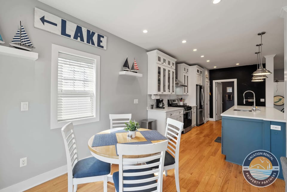 Breakfast nook with wall decor and natural light.