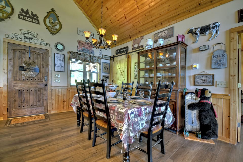 Gather for family meals in this beautifully appointed dining room inside our luxury cabin rental