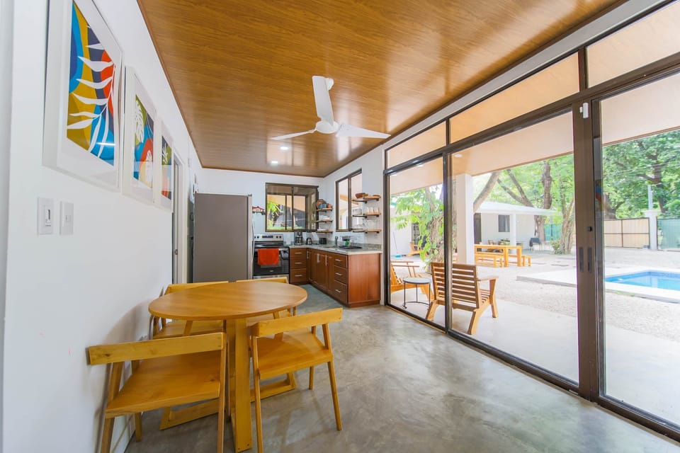 Villa #1 Dining area and view of pool