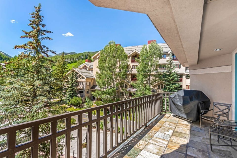 Expansive private balcony with mountain views