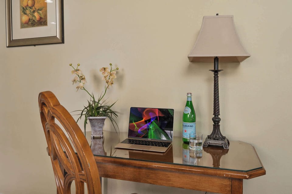 Stay connected and productive in our convenient workspace. Perfect for checking emails or getting some work done