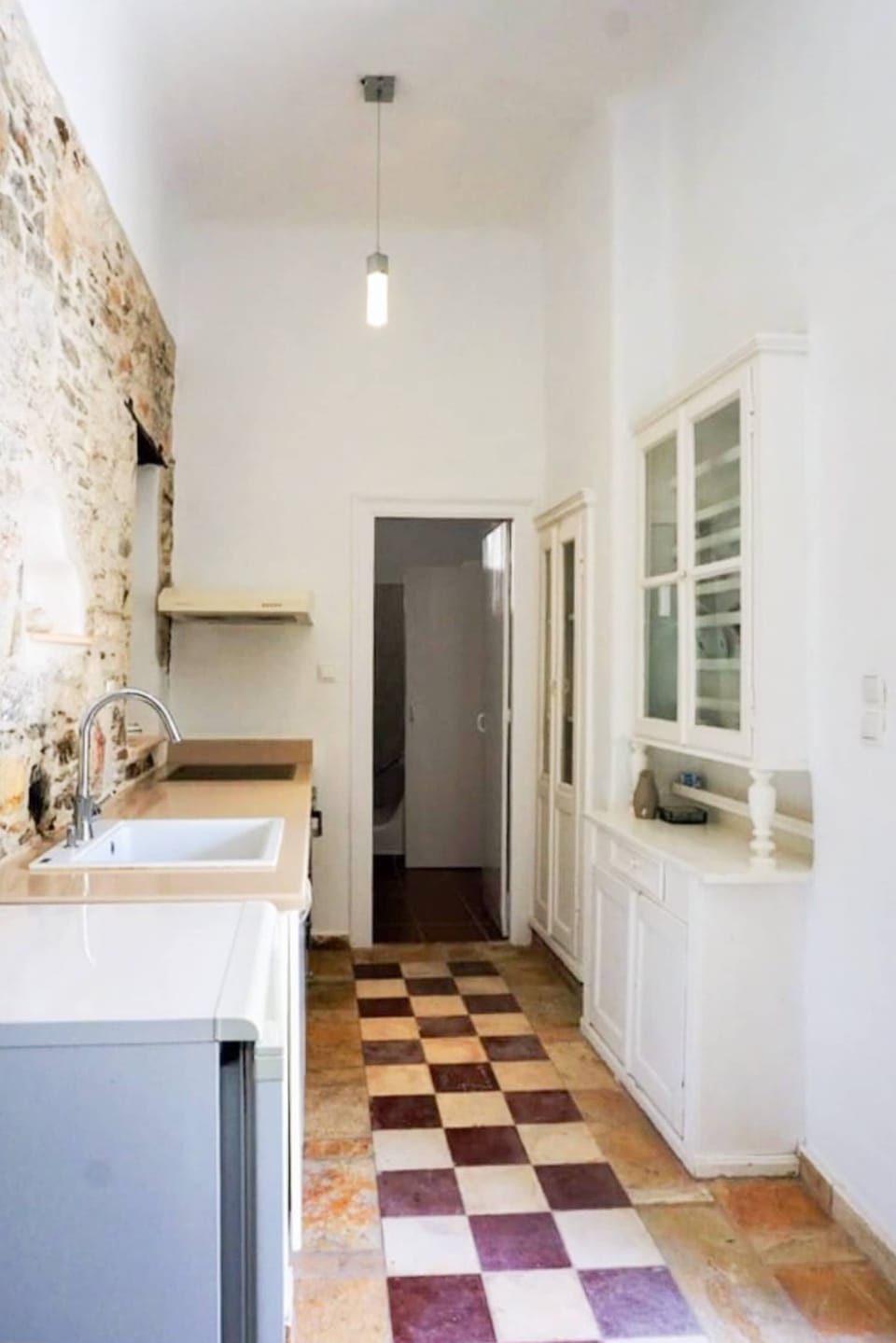 Traditional Kitchen with Stone Walls – A charming mix of old-world character and utility.