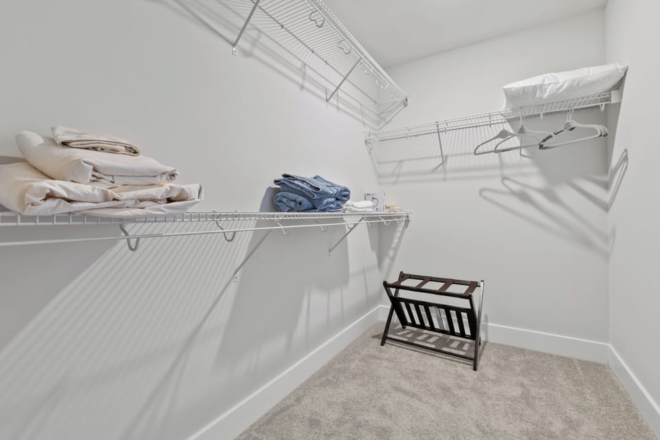 The walk-in closet in the Primary Bedroom offers plenty of space to unpack!