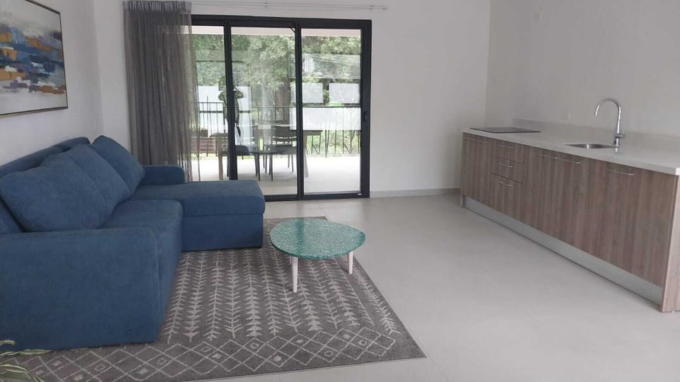 Second floor family area, walk out to porch. Small kitchenette. 