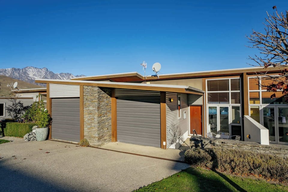 The home features a single car garage and patio area leading directly into the kitchen.