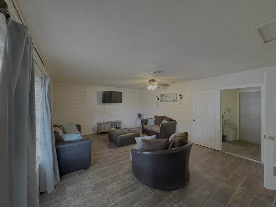 Stream your favorites on the smart TV in the spacious den