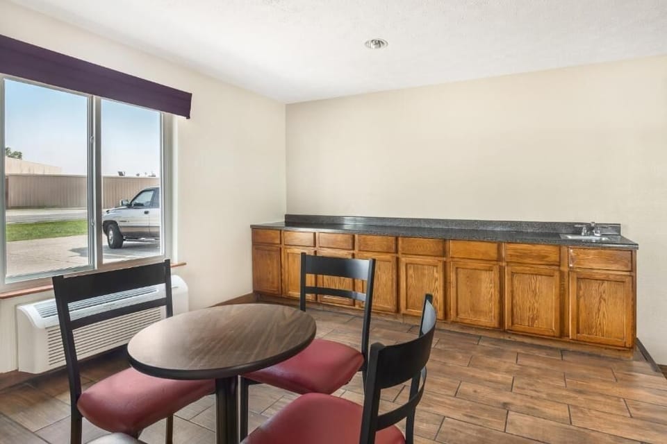 Enjoy simple meals at the convenient kitchenette and dining table.