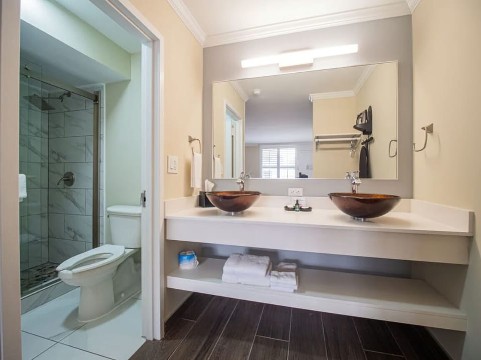 Refresh easily with double sinks and a spotless, bright bath.
