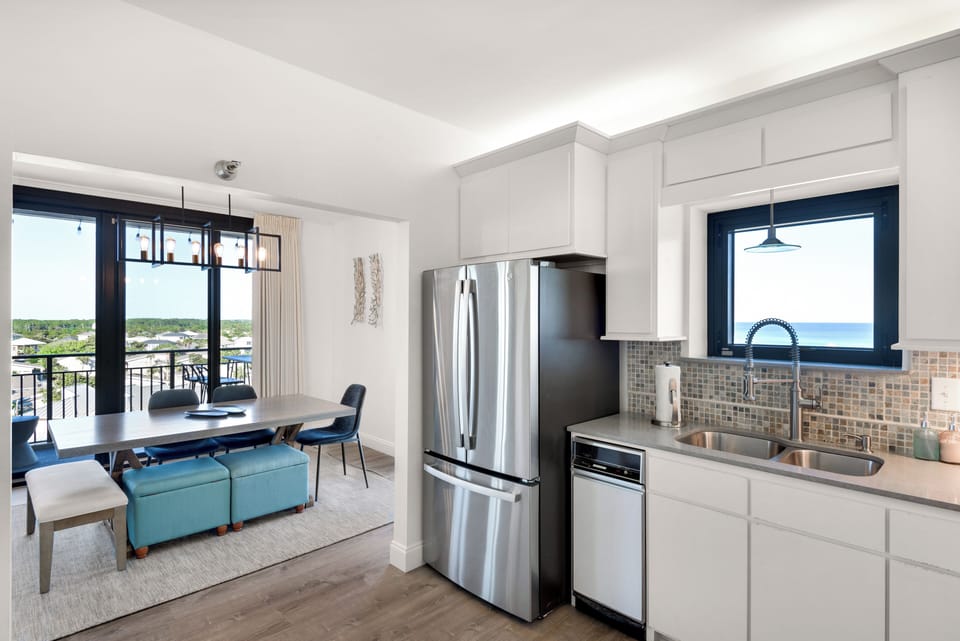 View of the beach from the kitchen sink