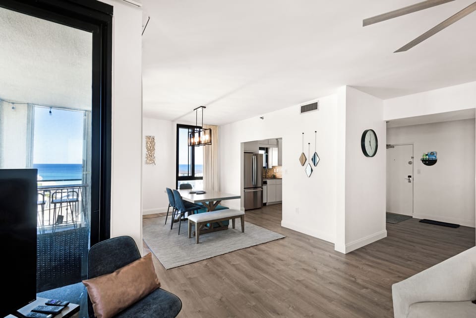 Looking towards the dining area and front entrance from the living room.