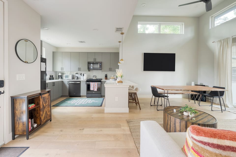 Spacious open layout seamlessly connecting the kitchen, dining, and living areas—perfect for gathering and entertaining.