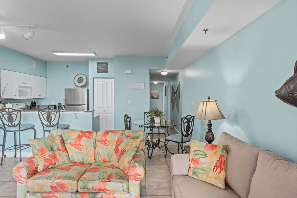 View of the main entrance and breakfast bar from living room.