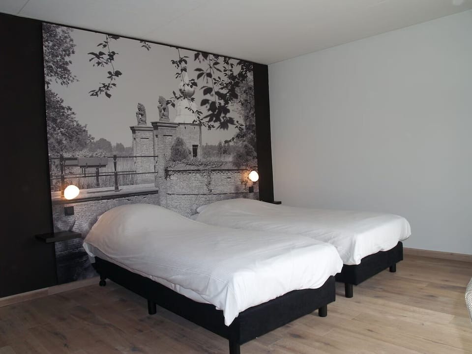 Unit with 2 Single beds. Exact unit will be assigned upon arrival. Views, colors, and decor may vary.