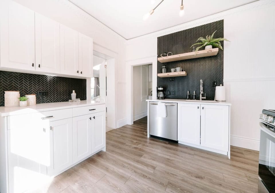 Fully remodeled kitchen with gas range and new appliances. Kitchen comes fully appointed with everything you need to cook a nice meal. There is also a French Press or drip coffee maker. A stove top kettle or electric kettle.