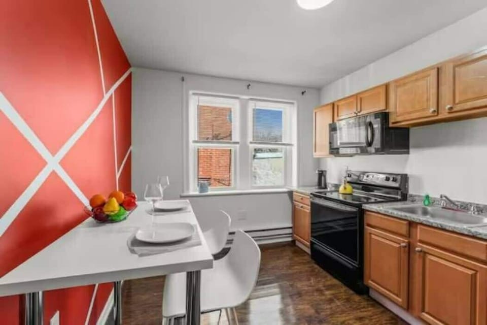 Gather around the table and enjoy a delicious meal with our beautifully designed dining and kitchen space