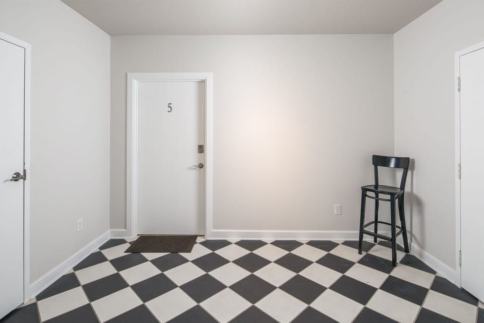 Second floor lobby, go to Unit 5 door