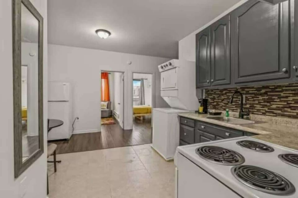 Modern appliances and stylish design define the kitchen