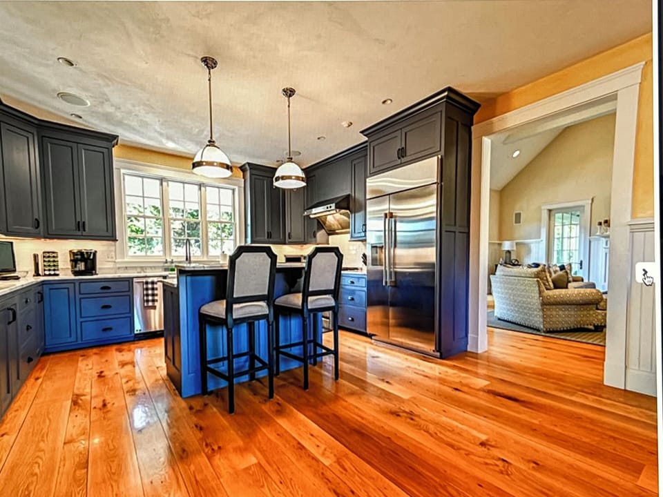 Kitchen and Island with Carrera Marble Countertops