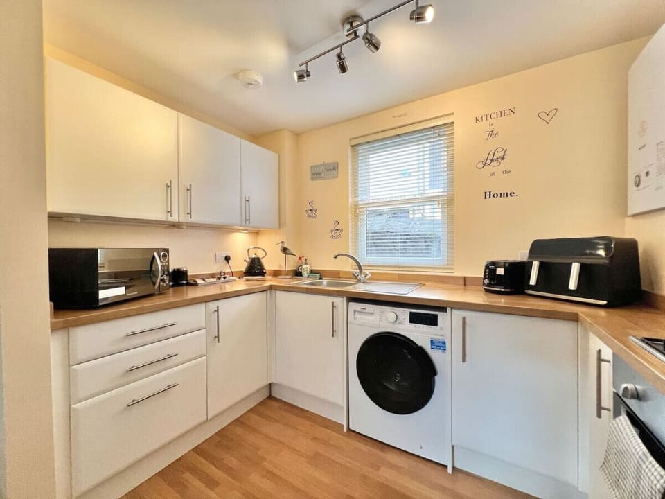 Open plan well equipped kitchen