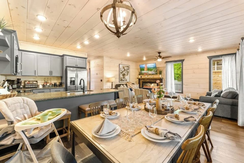 Gather around the spacious dining table set for 10, with additional seating at the kitchen island. Perfect for group meals, celebrations, or game nights — with a high chair included for little ones.
