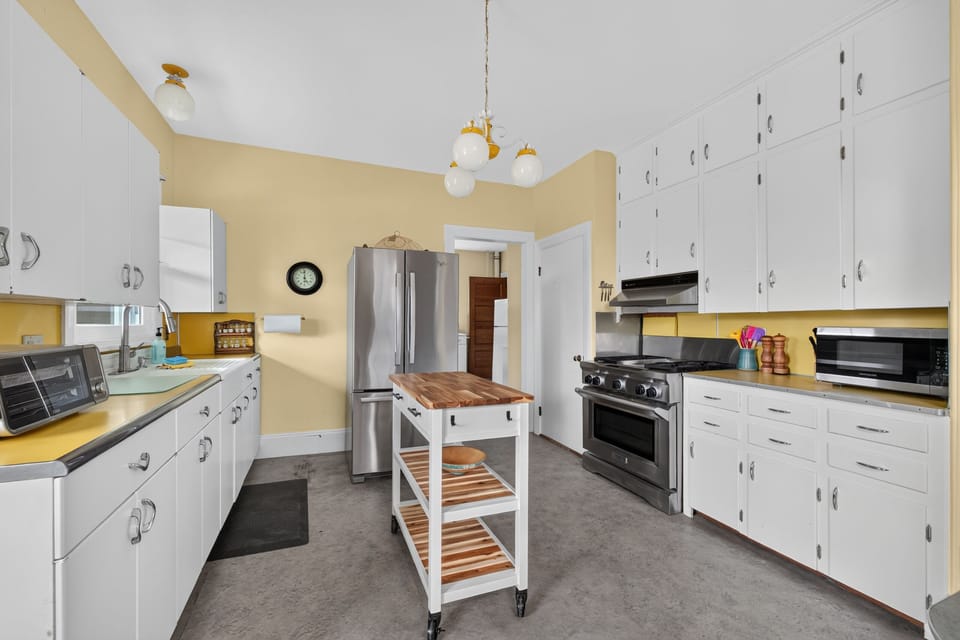 Kitchen with gas range.