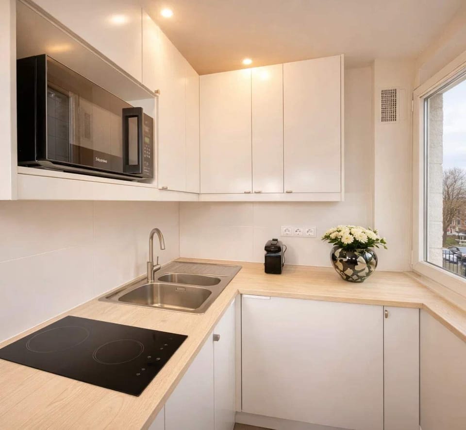 A kitchen ready with utensils and appliances to enhance your cooking experience.