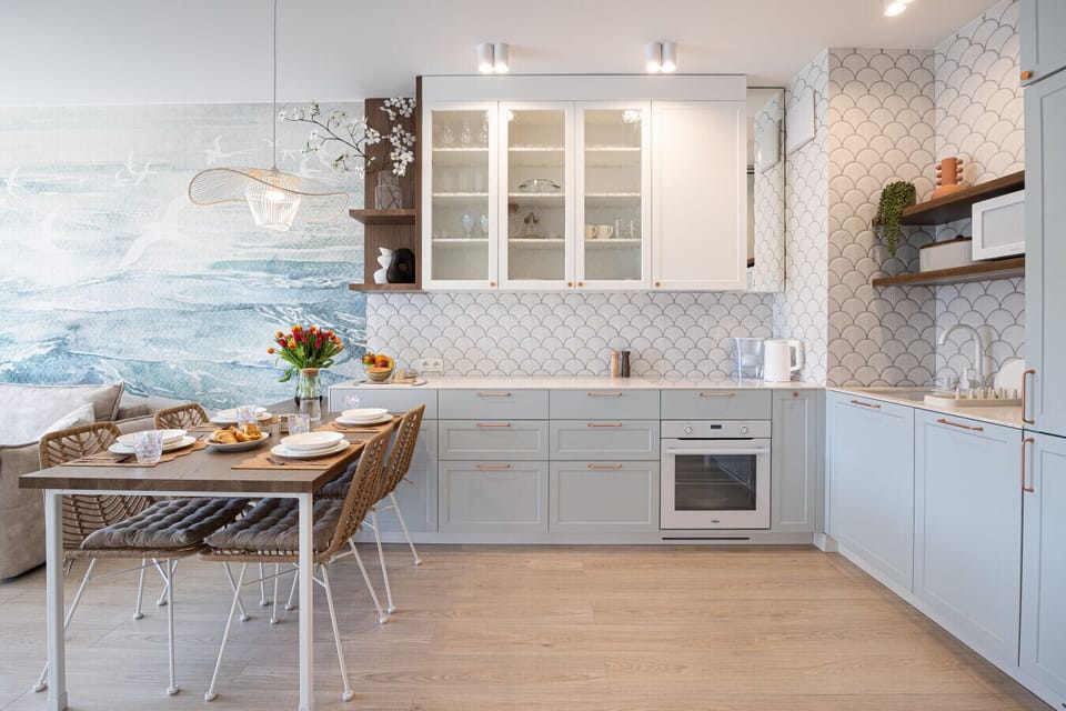 Functional and elegant kitchen with dining space. Baltic Sea retreat with the comfort of home.