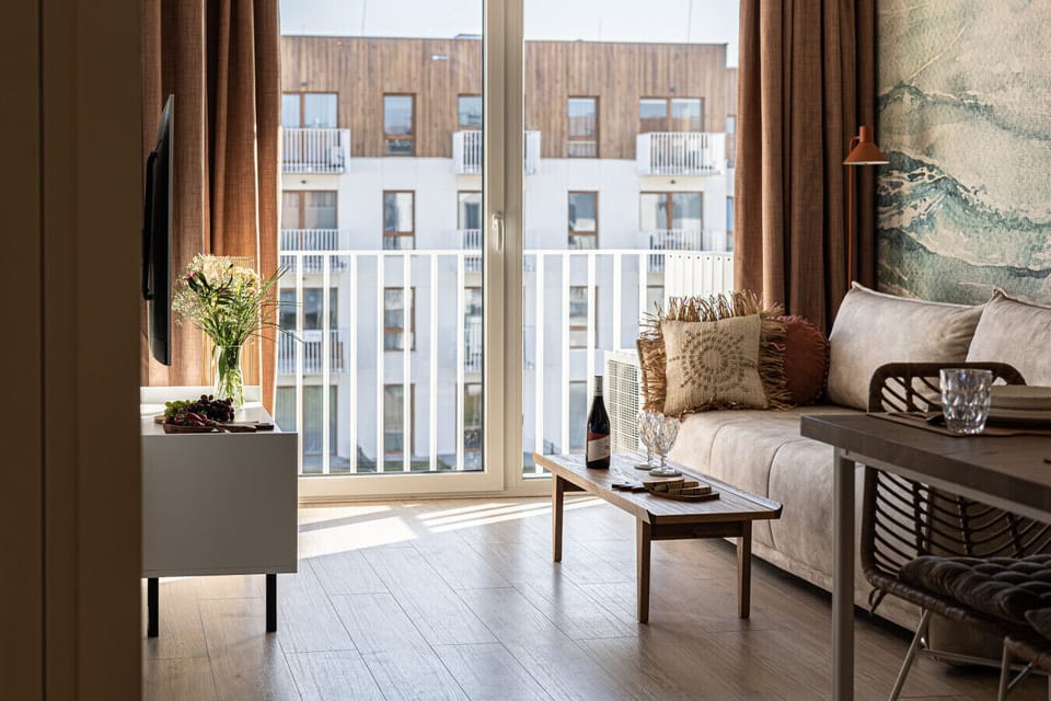 A cozy window-side spot overlooking the Let’s Sea courtyard. Just steps from the sandy beach and the sound of waves.