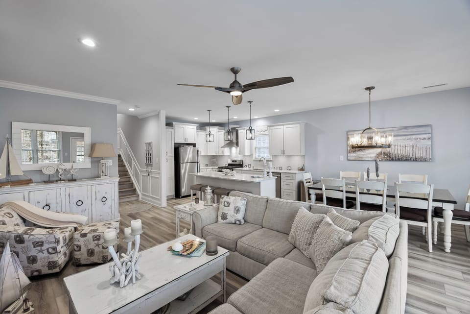 View of the living room, kitchen area and dining area
