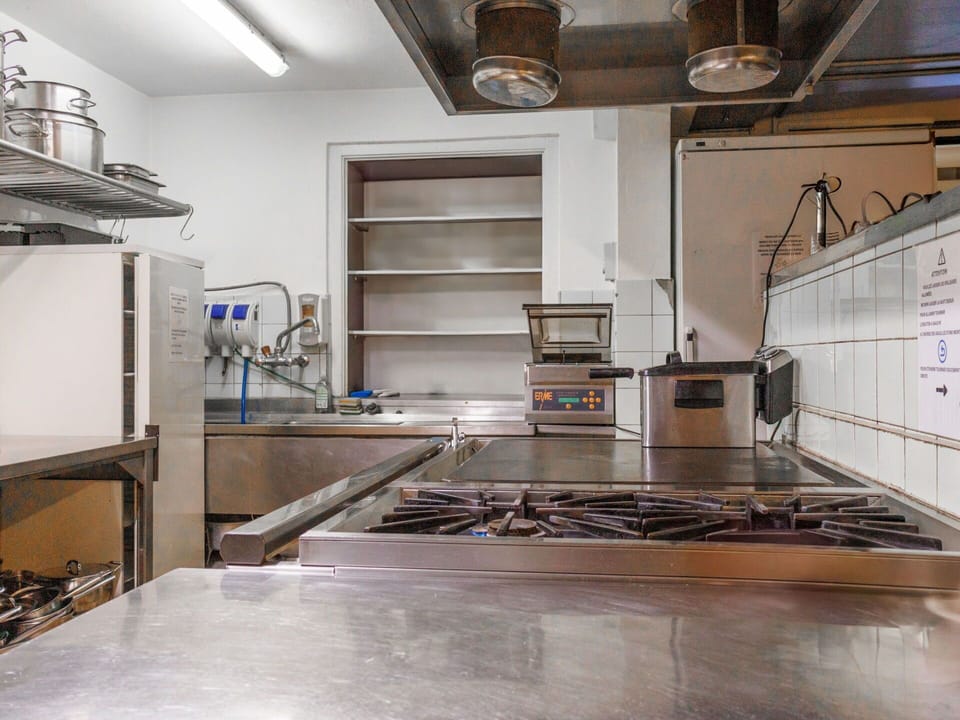 Kitchen, Ceiling, Interior Design, Lighting, Countertop, Kitchen Appliance, Flooring, Light Fixture, Major Appliance, Kitchen Stove