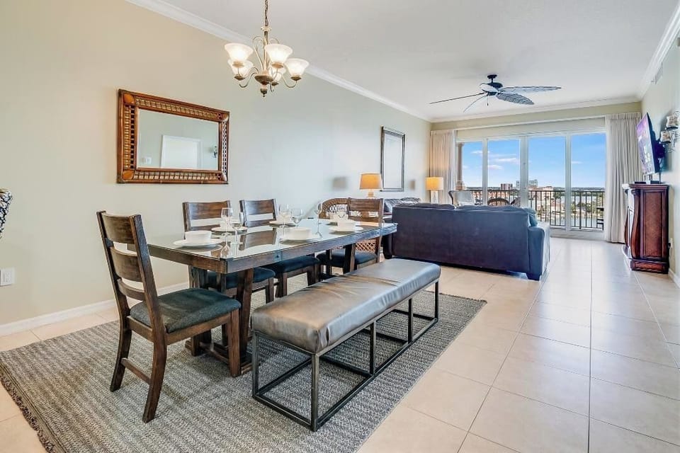 DINING AREA TO LIVING ROOM TO BALCONY.