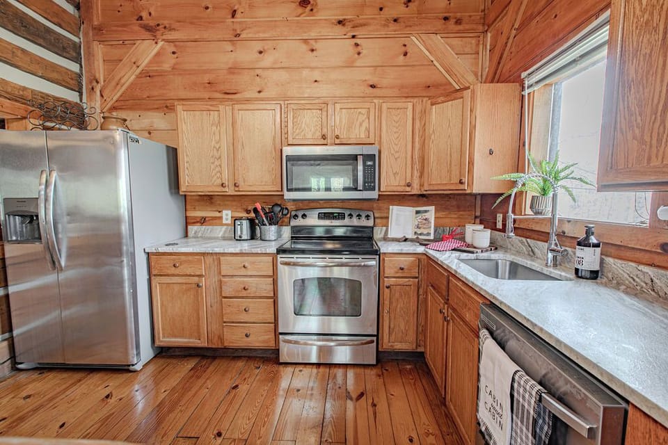 Passing through the front parlor, you will enter the kitchen