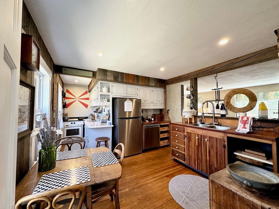 As you enter, you are greeted by the kitchen area-