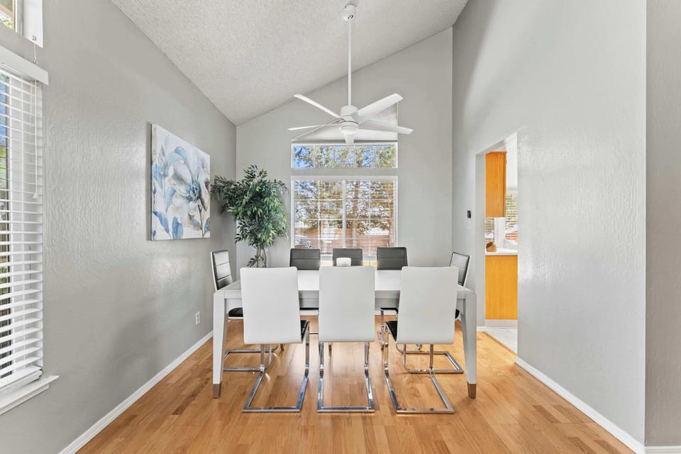 Modern charm meets functionality in this airy dining space designed for connection. 