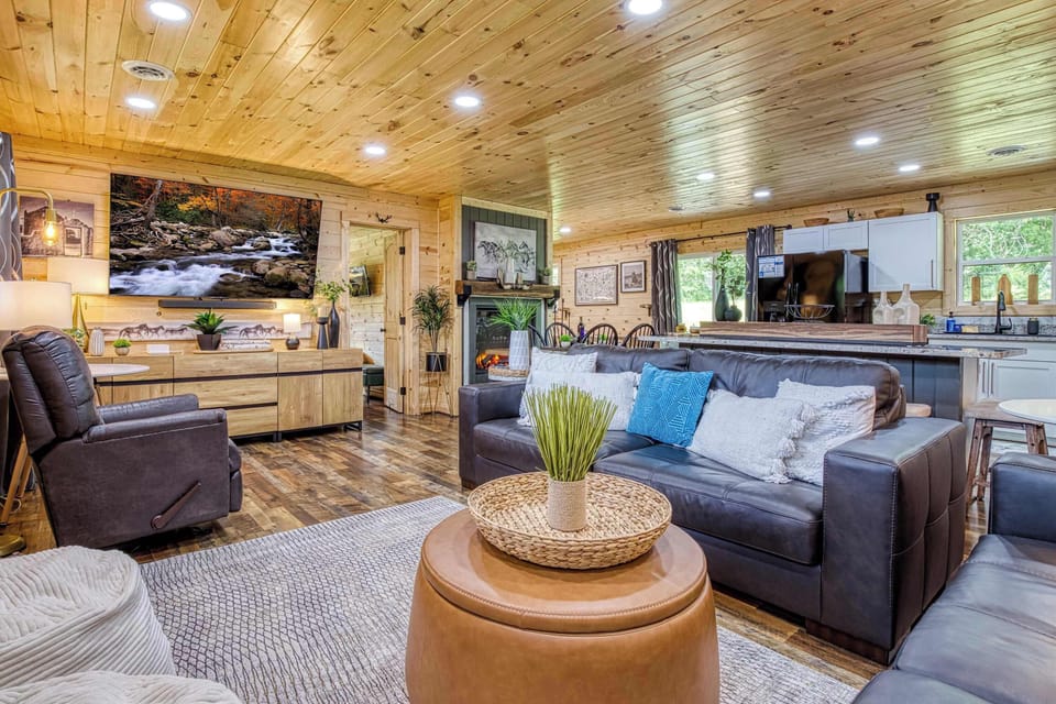 Enjoy open-concept living with seamless flow between the cozy living room and modern kitchen.