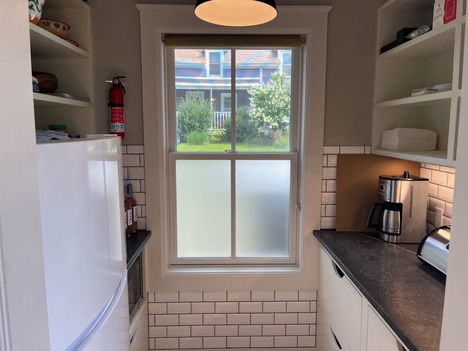 Pantry with second refrigerator and microwave
